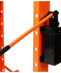 Heavy Duty Hydraulic Shop Press, Badass 30 Ton H-Frame Rig with black hydraulic cylinder and orange handle for bending jobs.
