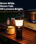 Rechargeable Camping Lantern LT1 With 8 LH351D LEDs, 24 Hour Runtime In Medium Mode, on table with outdoor gear setup