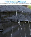 Road Trip Ready Roof Cargo Bag Heavy Duty 600D Water Resistant Gear Carrier for SUVs showing its waterproof capability in rain.