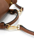 Close-up of Hella Sturdy Adjustable Cowhide Leather Shoulder Strap Kit With Vintage Gold Hardware, showcasing the clasp and strap detail.