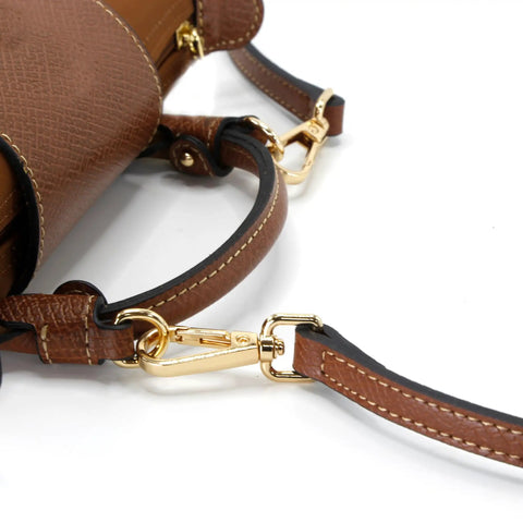 Close-up of Hella Sturdy Adjustable Cowhide Leather Shoulder Strap Kit With Vintage Gold Hardware, showcasing the clasp and strap detail.