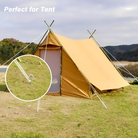 Heavy Duty 9 Inch Galvanized Steel Tent Stakes 25 Pack Rust Resistant Camping Pegs anchoring a tent on grassy terrain
