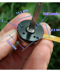 Close-up of 12V Brushless DC Drone Motor High Speed 28000 RPM PTZ Long Axis With Double Ball Bearing 2500KV for quadcopters.