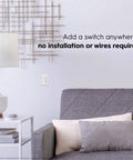 Cync Dimmer Smart Switch Wire Free With Bluetooth Control And White Tones No Wiring Required on living room wall near sofa