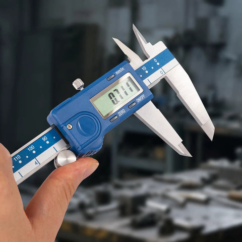 Left Handed Digital Caliper With Big LCD Screen Stainless Steel Body Dual Reading In Inches And Millimeters Ultra Accurate To 0.0015 Inches Or 0.03 Millimeters Resolution 0.0005 Inches Measures Outer Inner Depth And Step in use, showing 0.111 inches on LCD.
