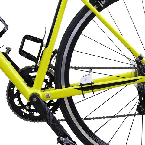 Indoor Cycling Sensor For Exercise Bike With Lifetime Free App Multiplayer Online Training Real Time Metrics Easy Install On Foldable Under Desk Mini Bike Roaming Scenes For Guided Home Gym Workouts on a yellow bicycle frame