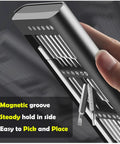 Close-up of Dope 27 In 1 Magnetic Mini Screwdriver Set with S2 steel bits and aluminum handle in hand, showing magnetic groove.