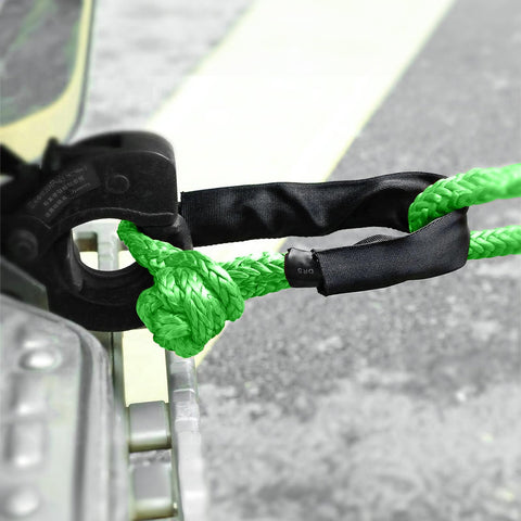 Two Pack Green Soft Shackle With 57,000 Lbs Breaking Strength Beefy Half Inch By 22 Inch Protective Sleeve attached to tow point