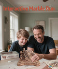 3D Wooden Puzzle And Marble Run Kit For Adults And Teens, Build And Play DIY Gear Ball Challenge With Auto Lift, Ramps And Victory Bell, Retro Gamepad Styled Model Building Toy For Christmas And Birthday Gifts. Father and son building a wooden marble run kit on a table.