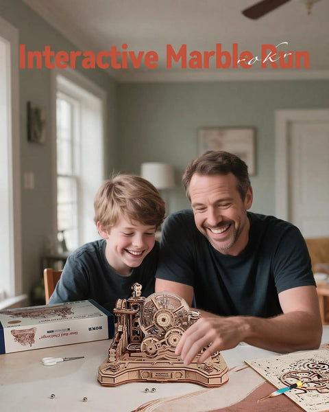 3D Wooden Puzzle And Marble Run Kit For Adults And Teens, Build And Play DIY Gear Ball Challenge With Auto Lift, Ramps And Victory Bell, Retro Gamepad Styled Model Building Toy For Christmas And Birthday Gifts. Father and son building a wooden marble run kit on a table.