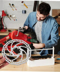 Bombproof Mechanical Disc Brake Rotor Kit For Mountain Bike Featuring Front And Rear 160 Mm Silver Rotors in a workshop setting.