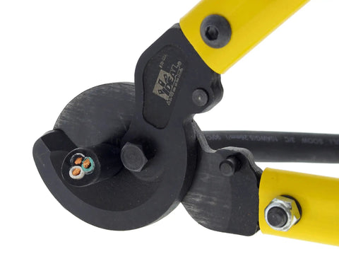 Close-up of Beast Mode Heavy Duty 22 Inch Long Arm Cable Cutter cutting 500MCM wire, showing precision jaws and replaceable blades