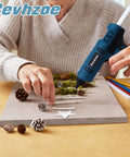 Person using Cordless Full Size Hot Glue Gun Kit With 20 Glue Sticks And Insulated Copper Nozzle 80W Anti Drip Workhorse Crafting Tool