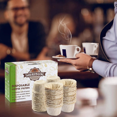 Box and stack of Disposable K Cup Filters 300 Count For Keurig 1.0 2.0 Brewers Unbleached Natural in a coffee shop