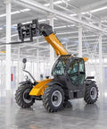 Kickass Workhorse Heavy Duty Telehandler Forklift With Long Telescopic Boom designed for rugged job site material handling, side view.