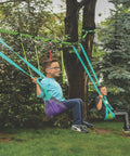 Children playing on a Swing Line Kit For Backyards Turn Healthy Trees Into The Ultimate Swing Set With Gym Rings Easy To Install
