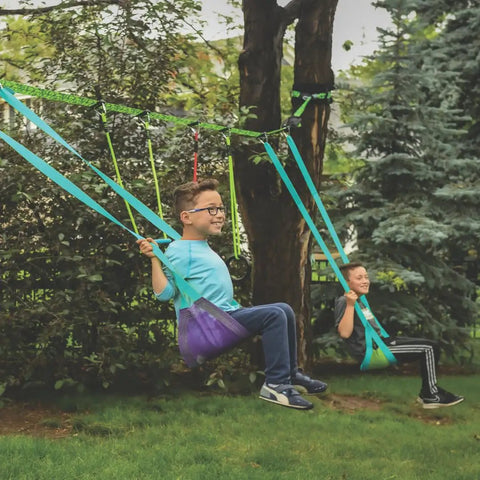 Children playing on a Swing Line Kit For Backyards Turn Healthy Trees Into The Ultimate Swing Set With Gym Rings Easy To Install