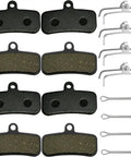 Beefy Semi-Metallic Disc Brake Pads For Mountain Bikes D02S D03S with hardware, showing semi-metallic surface and installation pieces.
