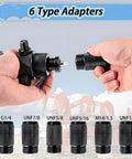 Hands holding 7 In 1 Hydraulic Nitrogen Pressure Test Kit with 6 type adapters shown, includes G1/4 and UNF adapters