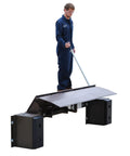 Heavy Duty Steel Mechanical Dock Leveler equipped with a beefy 66 inch ramp width, shown in use with grippy tread plate.