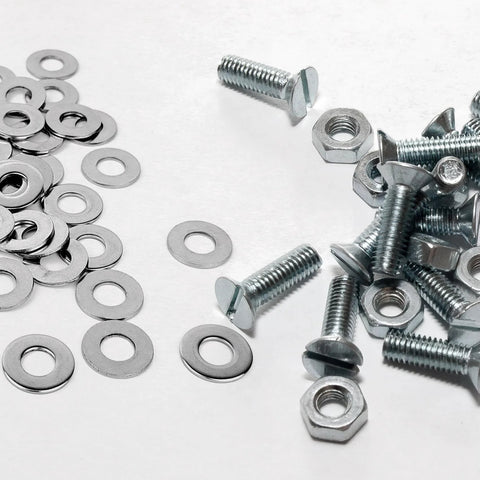 Stainless steel flat washers and screws on white surface; 5/16 in inner diameter, 11/16 in outer diameter