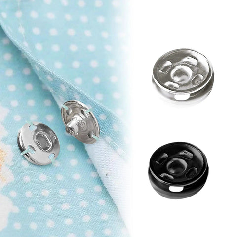 Close-up of 120 Set Sew-On Metal Snap Buttons Pack With 8mm And 10mm Sizes In Black And Silver on fabric