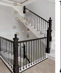 Fresh Square Black Iron Balustrade Spindles For Staircase And Balcony Guardrail Heavy Duty Wrought Iron Posts No Sweat Install Double Powder Coated Finish Straight Up Quality Build 30 Pack Measures 59 Inches Tall installed in modern staircase with black iron railings.