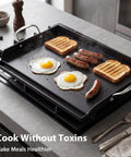 Preseasoned Cast Iron Griddle 25 By 16 Inch For Gas And Charcoal Grills with eggs, sausages, and toast cooking