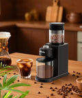 Wancle Electric Conical Burr Coffee Grinder With 25 Adjustable Grind Settings For Espresso Drip And French Press, compact black design with ground coffee.
