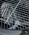 Close-up of the cooking grate on the Original Kettle Charcoal Grill 22-Inch Black with One-Touch Cleaning System and control dampers.