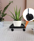 Plastic caster wheels set of 4, 2-inch, black nylon, front view on a low cart.
