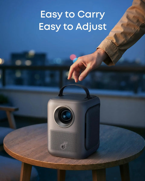 Person adjusting Portable Projector With WiFi And Bluetooth Flippable Dual 10W Dolby Audio Speakers 1080P FHD 4K Support on table