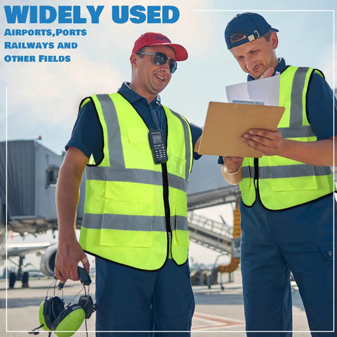 Two workers in reflective safety vests with pockets and zipper for work, high visibility vests for men and women near airport.