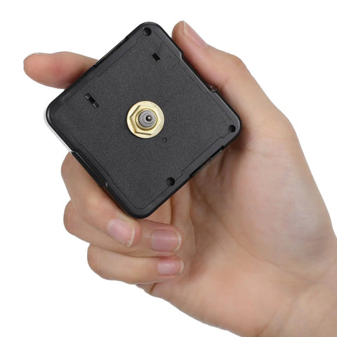 Hand holding Quartz Clock Movement Replacement Kit DIY Clock Mechanism Repair Part Silent Battery Operated Motor