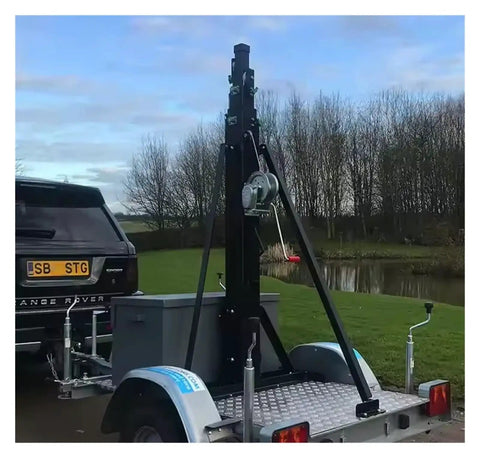 Real Deal 8 Meter Hand Winch Telescopic Lifting Mast with Durable Aluminum Profile on trailer for construction gear.