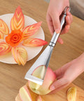 Using a Non Slip Fruit Carving Knife With V Shape Channel And Triangular Blade For Precise Diy Food Art In The Kitchen Sharp Engraving Tool For Home Cooks Easy Grip Handle Versatile Vegetable And Fruit Carving Tool on an apple for decorative cuts
