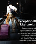 Traveler with Moody Burgundy 2 Wheel Carry On Luggage With Oversized Wheels And Trolley Handle Lightweight Rolling Suitcase On Escalator
