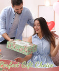Man gifting woman a floral design box labeled Perfect Gift Choice, suggesting 10 Piece Floral Design Garden Tools Set with Tote Bag and Knee Pad.