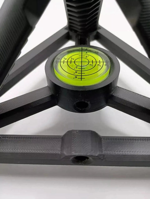 Close-up of leveling bubble on R10 Golf Launch Monitor Alignment And Leveling Stand For Indoor And Outdoor Practice Heat Resistant Build Stable Setup For Precise Readings And Easy Positioning.