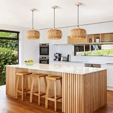 Score Some Major Farmhouse Vibes With This Hand-Woven Rattan Pendant Light Featuring A Fresh 12 Inch Wicker Shade Perfect For Killing It On Your Kitchen Island With Top Shelf Lighting Style, hanging above a kitchen island.