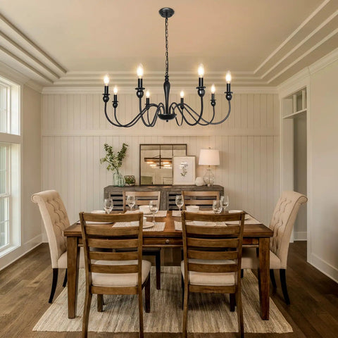 Dining room with Black Farmhouse Chandelier With 8 Candle Style Lights, rustic metal ceiling fixture above wooden table.