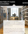 Room with vinyl records on shelves, turntable setup, and high fidelity audio accessories display in store setting.