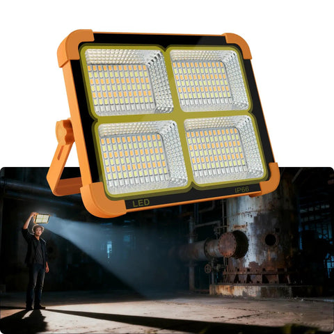 Solar Powered Work Light With 100W LED, 16500mAh Battery, 10000 Lumens lighting up a dark industrial setting