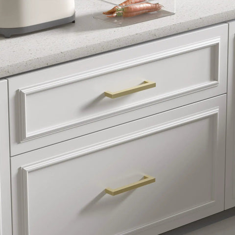 20 Pack 3 Inch Gold Cabinet Handles Brushed Brass Dresser Pulls Solid Square Bar Drawer Knobs For Kitchen Bathroom Cupboard Matte Gold Finish Easy Install Modern Cabinet Hardware Set on white drawers.