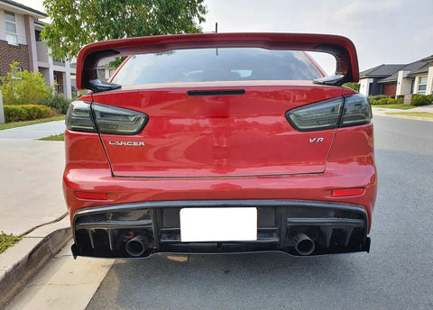 Rear view of red Mitsubishi Lancer Evolution X with Dark Smoked Lens Full LED Trunk Lid Center Mount Third Brake Light Bar Assembly.