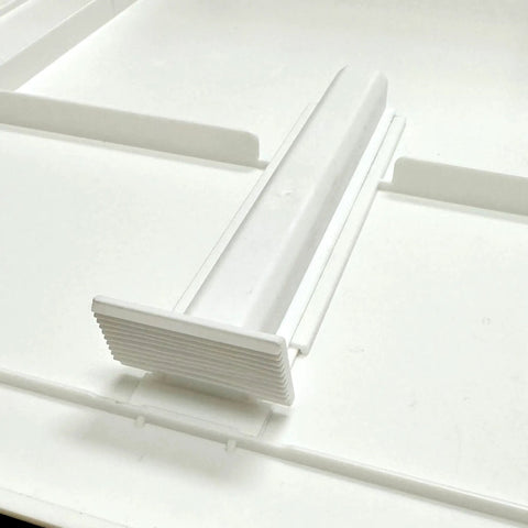 Close-up of 8X8 Inch White Plastic Spring Fit Access Panel With Self Expanding Grippers For Drywall Holes showing grip mechanism.