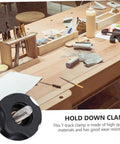 Beefy Heavy Duty Woodworking Clamp With Quick Action Hold Down For Carpentry Projects on a woodworking bench