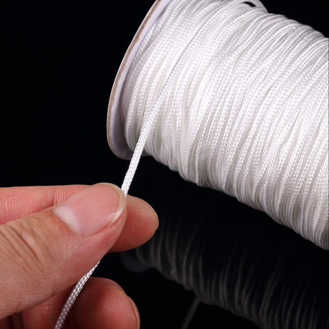 Upgraded Window Setup With This Dope Set Including 100 Clear Roman Rings And 55 Yards Of Heavy Duty White Cord For Stress Free Reweaving And Clean Modern Vibe For Quick Diy Projects Around The House - close-up of heavy-duty white cord on a spool