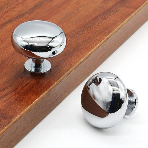 5 Pack Polished Chrome Cabinet Knobs, Round Drawer Handles For Kitchen Cabinets, Zinc Alloy Set on wood surface