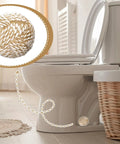 Killer 2 Pack Boho Knot Toilet Bolt Caps Ceramic Screw Covers Decor Bathroom Upgrades on a toilet base in a modern bathroom.